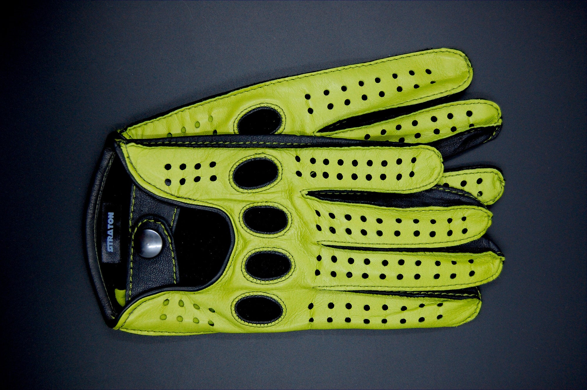 Green leather driving gloves